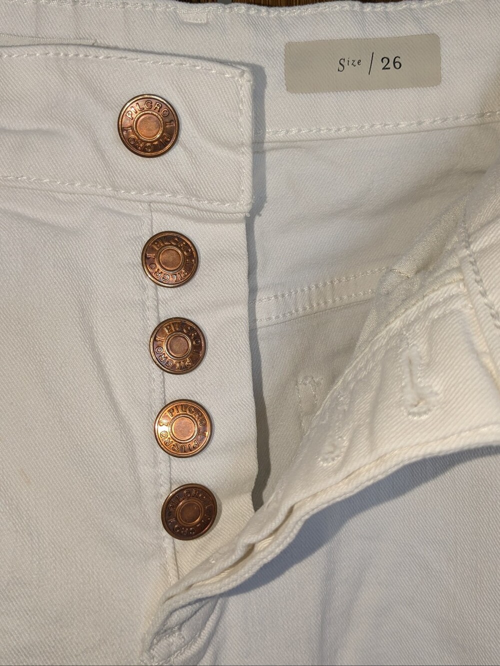 Pilcro and the Letterpress White High-Rise Jeans with Copper Buttons